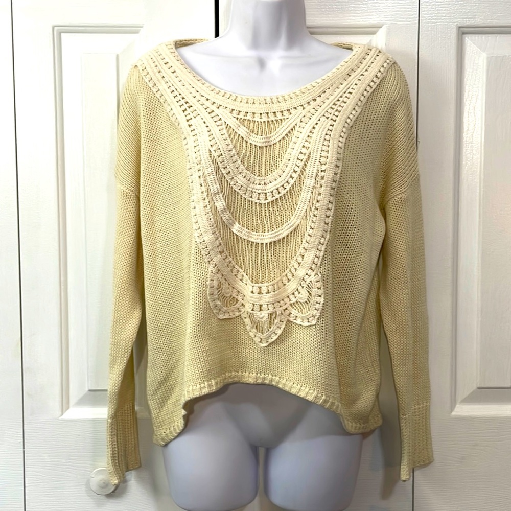 Unique Beige lightweight sweater with intricate knit detail.